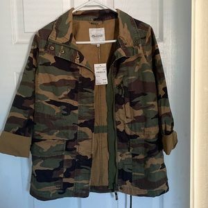 Utility jacket never worn. Is still brand new.